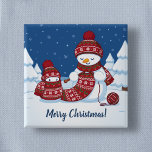 Snowman Knitting Christmas Scarf 2 Inch Square Button<br><div class="desc">Cartoon illustration of two adorable snowmen dressed in knitted hats and scarves. The big snowman is knitting an oversized scarf for the little one. The scarf is already wrapped several times around the cute little snowman.</div>