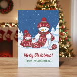 Snowman Knitting Christmas Scarf from Family Holiday Card<br><div class="desc">Cartoon illustration of two adorable snowmen dressed in knitted hats and scarves. The big snowman is knitting an oversized scarf for the little one. The scarf is already wrapped several times around the cute little snowman. Customizable text.</div>