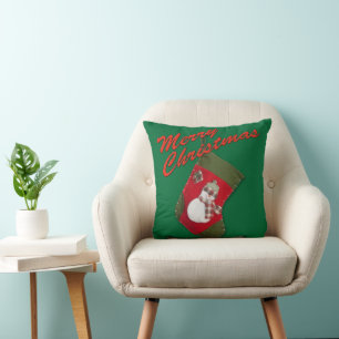 Snowman on Christmas Stocking Over Green Throw Pillow