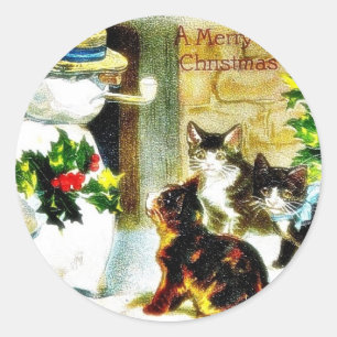 Snowman standing with holy leaves and cats around classic round sticker