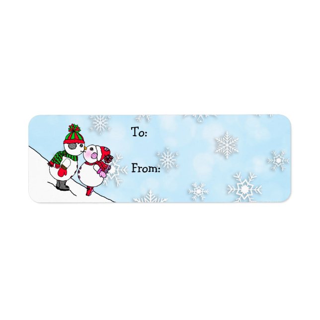 Snowmen de Noël et femme s'embrasser et de (Devant)