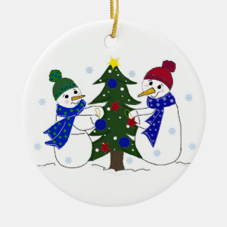 Snowmen Decorating a Christmas Tree Ceramic Ornament
