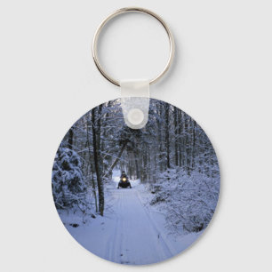Snowmobiling after fresh snowfall Winter Keychain