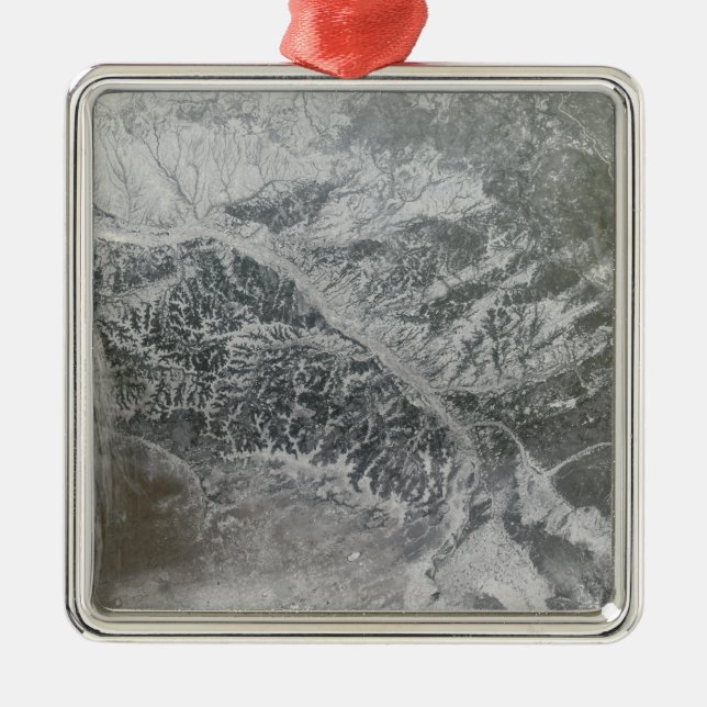 Snowy and hazy central Russia showing the Ob Ri Metal Ornament (Front)
