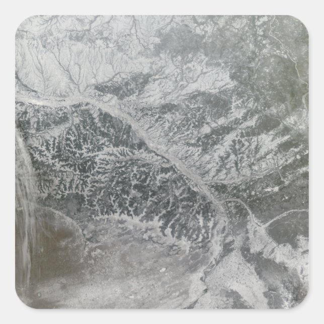 Snowy and hazy central Russia showing the Ob Ri Square Sticker (Front)