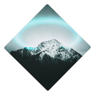 Snowy mountain mysterious blue neon light graduation cap topper
