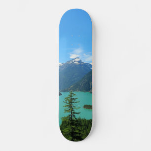 Snowy Mountain Turquoise Lake in Washington Skateboard