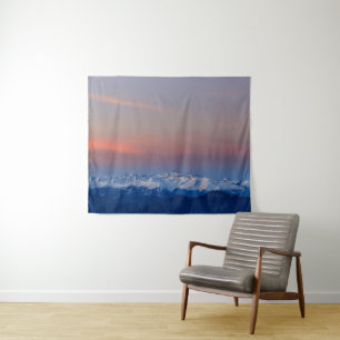 Snowy mountains with magical sky tapestry