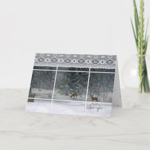 snowy night trees and deer looking through window holiday card