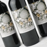 Snowy Pine Christmas Wreath Wine Label<br><div class="desc">Holiday wine bottle labels feature a greeting and your name with a beautiful snow flocked pine wreath decorated with white and gold Christmas tree ornaments and flowers. MATCHING items in our store.</div>