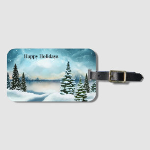 Snowy pine trees near a lake luggage tag