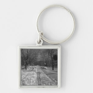 Snowy residential street keychain
