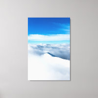 Snowy winter mountain wrapped in clouds