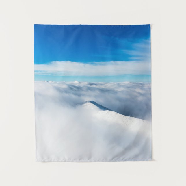 Snowy winter mountain wrapped in clouds tapestry (Front)
