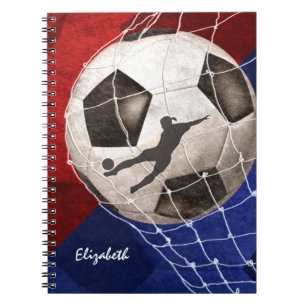 Soccer ball denting the net red blue girl's soccer notebook