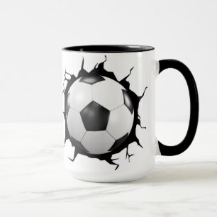 Soccer ball going through a wall mug