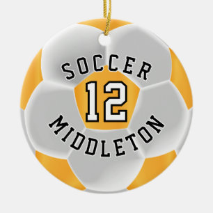 Soccer Ball in a Gold Yellow and White Ceramic Ornament