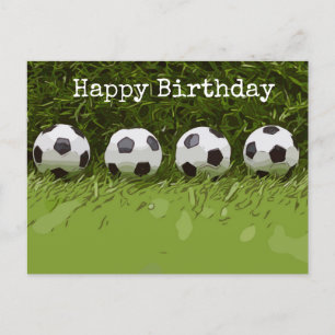 Soccer ball is on green grass Happy Birthday Card