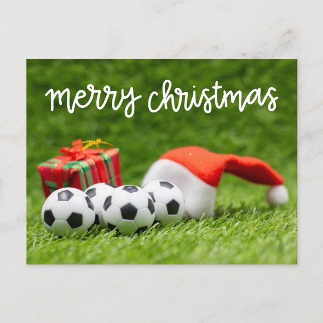 Soccer ball on green grass for Christmas Holiday   (Front)