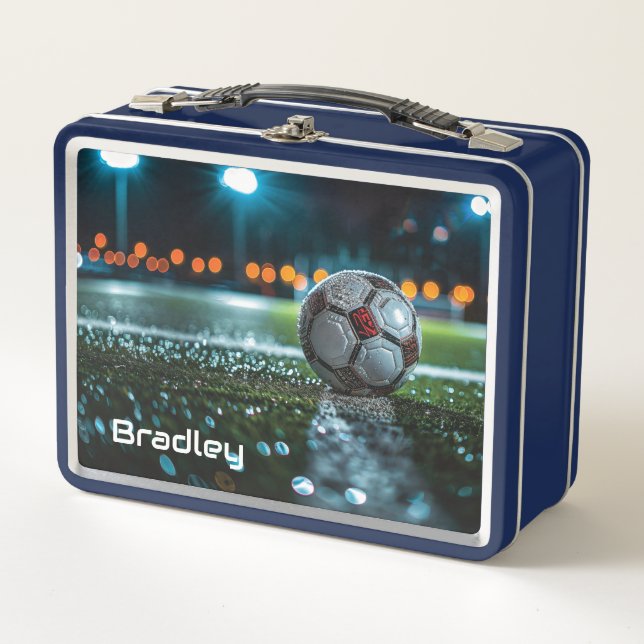 Soccer ball on the empty wet arena pitch metal lunch box (Front)