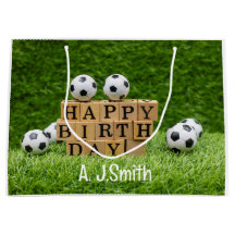 Soccer Birthday with balls on green grass