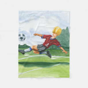 Soccer Player Kicking a Ball by Jay Throckmorton Fleece Blanket