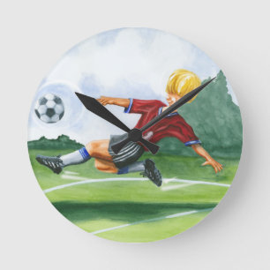 Soccer Player Kicking a Ball by Jay Throckmorton Round Clock