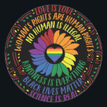 Social Justice Word Art   Classic Round Sticker<br><div class="desc">Colourful word art design sticker covers all the bases with its shoutout to human rights.  Quotes include:  Black Lives Matter,  Science is Real,  Love is Love,  Women's Rights are Human Rights,  No Human is Illegal,  and Kindness is Everything. Black background with centre rainbow heart and sunflower</div>
