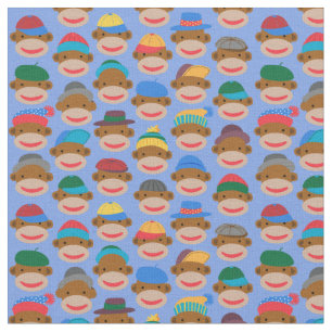 Sock Monkey Heads with caps on Blue Fabric