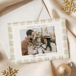 Soft Beige Gingham Photo Christmas Holiday Card<br><div class="desc">Capture a cherished memory with our Soft Beige Gingham Christmas Holiday Card! This modern design allows you to showcase a family favourite photo, set against a charming soft beige gingham background with the festive title "Merriest Christmas." Personalize the front with your family name and add a heartfelt holiday message on...</div>