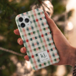Soft Evergreen Gingham Monogram iPhone 15 Pro Case<br><div class="desc">Add a touch of personalized style to your iPhone 15 Pro with this charming Soft Evergreen Gingham Monogram Case. Featuring a modern plaid design in soft evergreen and festive red hues, this protective case blends timeless elegance with seasonal flair. The customizable monogram option allows you to make it uniquely yours...</div>