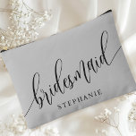 Soft Grey Bridesmaid Modern Calligraphy Accessory Pouch<br><div class="desc">Celebrate your bridal party with this elegant soft grey bridesmaid accessory pouch. Featuring modern calligraphy and customizable with your bridesmaid's name, this pouch is both stylish and practical. The soft dusty sage colour and elegant script create a sophisticated look, perfect for holding makeup, toiletries, or other essentials. This personalized pouch...</div>