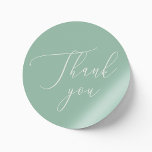 Soft Mint Green Wedding | Calligraphy Thank You Classic Round Sticker<br><div class="desc">Say thank you with fresh, refined style using this elegant round wedding sticker in soft mint green. Featuring graceful calligraphy and a clean minimalist layout, this sticker adds a subtle touch of charm to your wedding favours, envelopes, or gift packaging. The muted tone blends the softness of mint with the...</div>