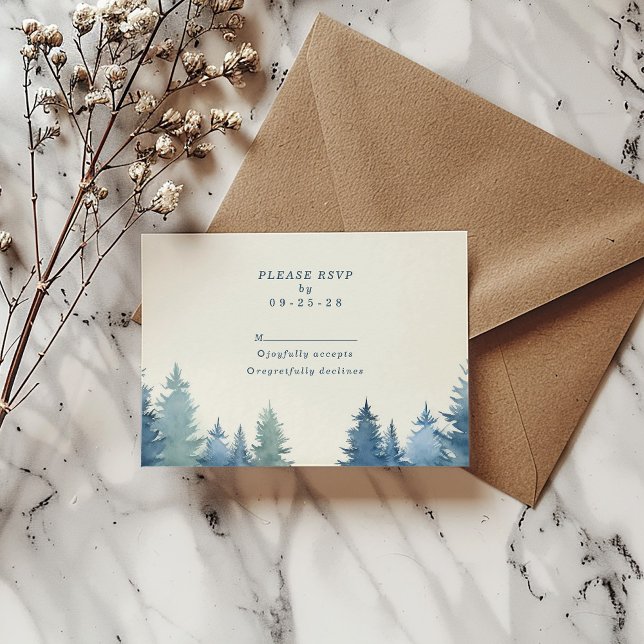 Soft pine trees green wedding rsvp card (Soft pine trees wedding rsvp response card on top of a brown envelope.)