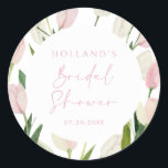 Soft Pink Tulip Bridal Shower Classic Round Sticker<br><div class="desc">Celebrate the bride-to-be with our Soft Pink Tulip Bridal Shower sticker. Featuring delicate watercolor tulips and elegant typography, this design captures the essence of spring. Adorned with soft pink and white tulips, it sets a serene tone for your event. The airy pink font adds sophistication, ensuring details are presented with...</div>