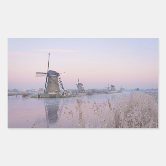 Soft sunrise light in winter over windmills sticker (Front)
