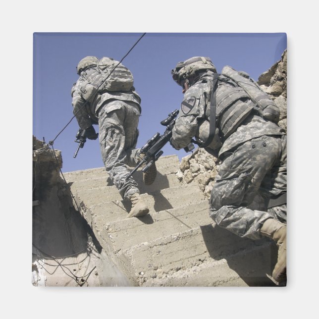 Soldiers running up staircase of a building magnet (Front)