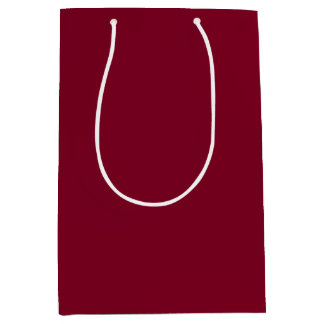 Solid colour burgundy maroon medium gift bag