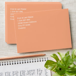 Solid colour plain apricot pastel orange envelope
