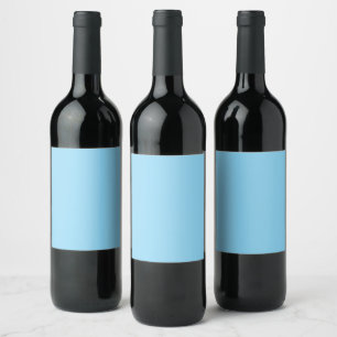 Solid light blue background evenly coloured wine label