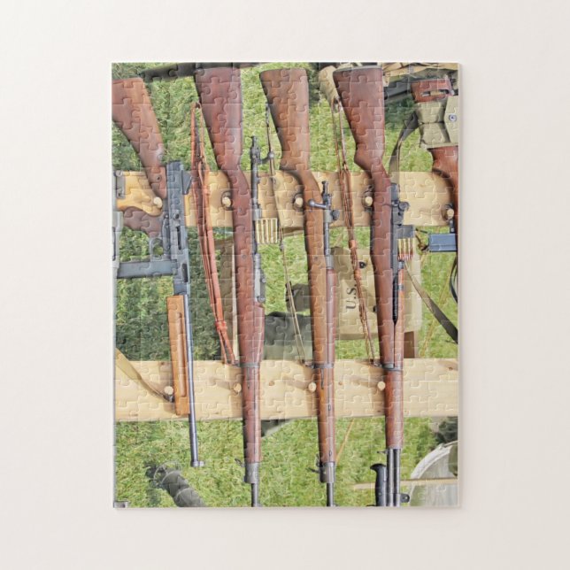 Some WWII Small Arms On A Rack Outside Jigsaw Puzzle (Vertical)