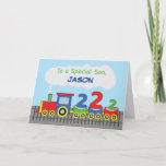 Son 2nd Birthday Colourful Train on Track Card<br><div class="desc">For a son who will soon be turning two soon is this cute and colourful train and track card. You can see on the front a train carrying the numbers “2” indicating the age of the celebrant. Also a space is allotted for his name to be personalized. Get this card...</div>