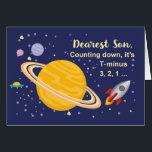 Son Birthday Planets in Outer Space with Rocket<br><div class="desc">Wish your son a happy birthday that is out of this world! Saturn is seen in the golden yellow colour with stars and other planets surrounding it. A rocket ship has just blasted off to wish happy birthday.</div>