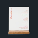 Sophisticated Orange Serif Wedding Menu Acrylic Sign<br><div class="desc">This elegant wedding menu features a sophisticated layout with a vertical orientation, showcasing a solid black background that highlights the text elements. The design includes a warm orange cursive script spelling "Drinks" on the left, while neatly organized text blocks in shades of orange and white list beer, wine, and spirits...</div>