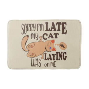 Sorry I am late my cat was laying on me Bath Mat