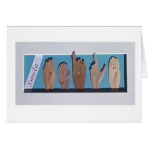 "Sourire" dans la langue des signes