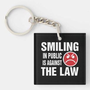 Sourire en public est contre la loi