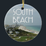 South Beach Miami Florida photo Ceramic Ornament<br><div class="desc">South Beach,  Miami,  Florida landscape scene of the beach and part of the city skyline with the words "South Beach" at the top in an art deco style font.</div>