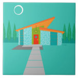 Space Age Cartoon House Ceramic Tile<br><div class="desc">This Space Age Cartoon House Ceramic Tile is a retro lover’s dream come true. The minimalist art design features an aqua stone house with large, peacock blue windows. Hanging from the atomic, slanting, orange roof, a yellow sputnik light fixture illuminates the front door. The recessed red front door with starburst...</div>