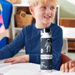 Space Astronauts Stars & Planets Custom Kids'  Water Bottle<br><div class="desc">Introducing the "Space Astronauts Stars & Planets Custom Kids' Water Bottle, " the perfect hydration companion for young space enthusiasts and aspiring astronauts! This captivating water bottle features hand-drawn illustrations of astronauts floating in space, surrounded by twinkling stars and colourful planets. The whimsical and detailed artwork creates a magical and...</div>